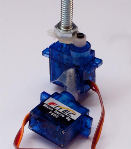 Align the servo horns when both servos have been commanded to their center (neutral) position