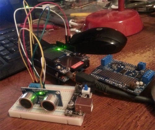 Paralax ping ultrasound and DHT11 temp sensor.